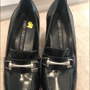 Black Larry Stuart collection loafer with heel, made in Italy